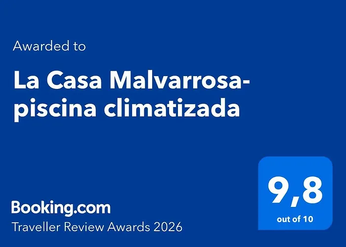 בית נופש La Casa Malvarrosa- Piscina Climatizada אמפוארו